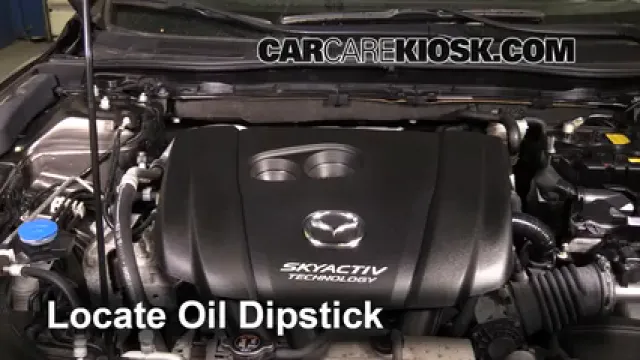 2014 Mazda 3 Touring 2.0L 4 Cyl. Sedan Aceite Controlar nivel de aceite